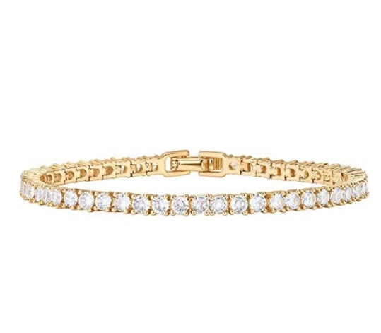 Gold bracelet with diamond accents on a white background