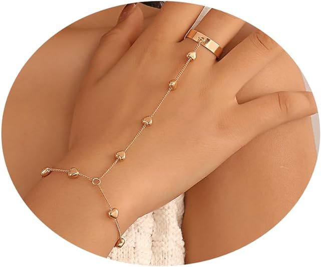 Rose gold bracelet on a hand with a neutral background