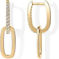 Gold hoop earrings with clear gemstones on a white background
