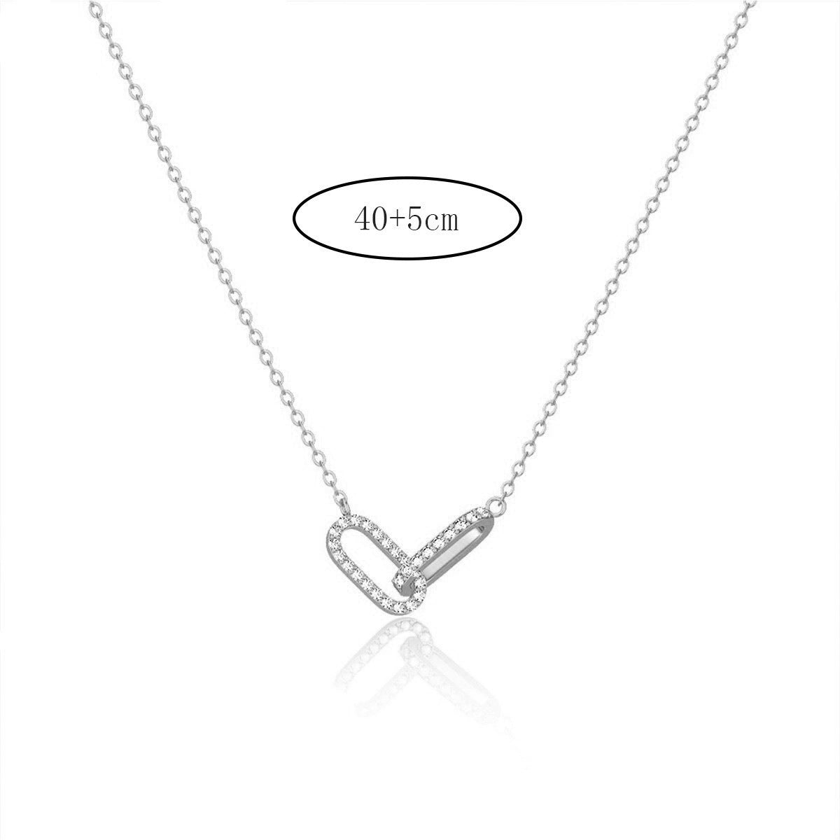 Silver necklace with a V-shaped pendant on a white background