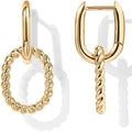 Gold hoop earrings with twisted design on a white background