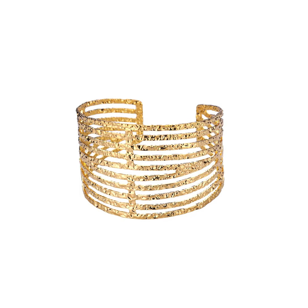 Gold bracelet on a white background