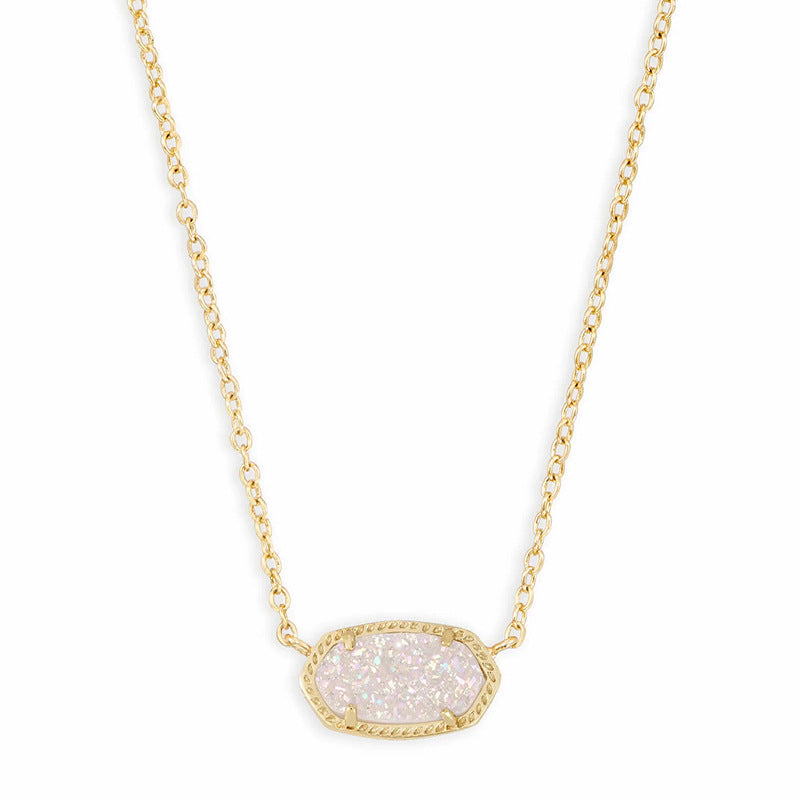 Gold necklace with a white pendant on a white background