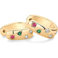 Two gold rings with gemstones on a white background